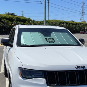 Upgrade your Jeep Grand Cherokee with the best custom sun shade made for your exact Gand Cherokee windshield. This official MOPAR licensed version includes the "Jeep Grill" logo for that added touch of AWESOME; however we do have other <a href="https://www.covercraft.com/c/sunscreens">custom car sun shades</a> without the logo. Protect your interior from fading and cracking with our premium sun shades designed to reflect, insulate, and keep your vehicle cooler.