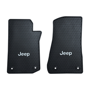 Upgrade your Jeep Wrangler with official Jeep logo all weather floor mats. These are not thin liners that will flap in the wind when driving with the doors off, but heavy-duty rubber mats contoured to your exact floors with enough weight to keep secure when driving. The rugged design is perfect for wherever your offroad adventures take you. The Jeep logo alone will make you smile every time you enter your Jeep.